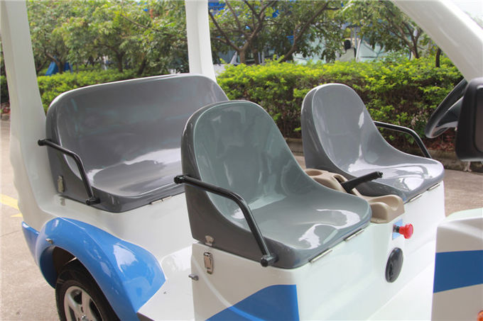 Coche eléctrico azul/blanco del golf con los asientos del vidrio de fibra de Toplight 4 para el centro turístico 1